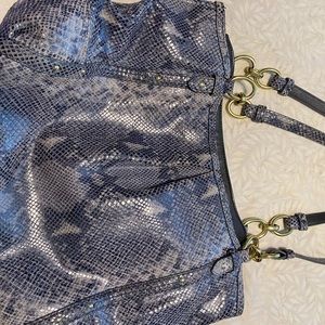 Snake pattern Coach tote.